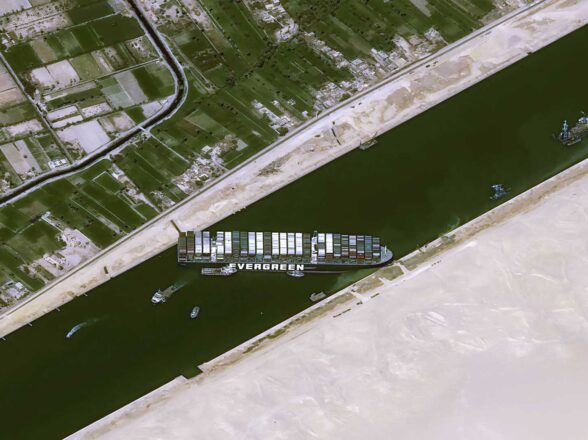 THE CLOSURE OF THE SUEZ CANAL BY THE STUCK SHIP THREATENS TO WEIGH DOWN GLOBAL TRADE FOR WEEKS